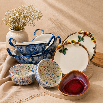 Premium ceramic tableware collection featuring bowls, serving dishes, and handcrafted plates in a stylish setup, perfect for dining, kitchen use, and gifting.