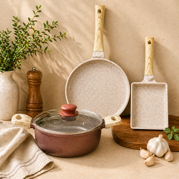 Cookware set featuring non-stick tawa, kadai, fry pan, grill pan, sauce pan and dosa tawa in a modern kitchen setup, ideal for everyday cooking and kitchen essentials.