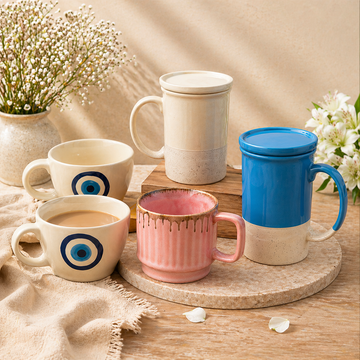 Affordable cup set with ceramic cups and kettle-style mugs arranged in a premium setup, featuring stylish cup set and drinkware for tea and coffee, perfect for home use and gifting.